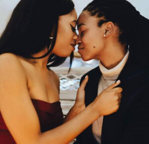 two black women kissing
